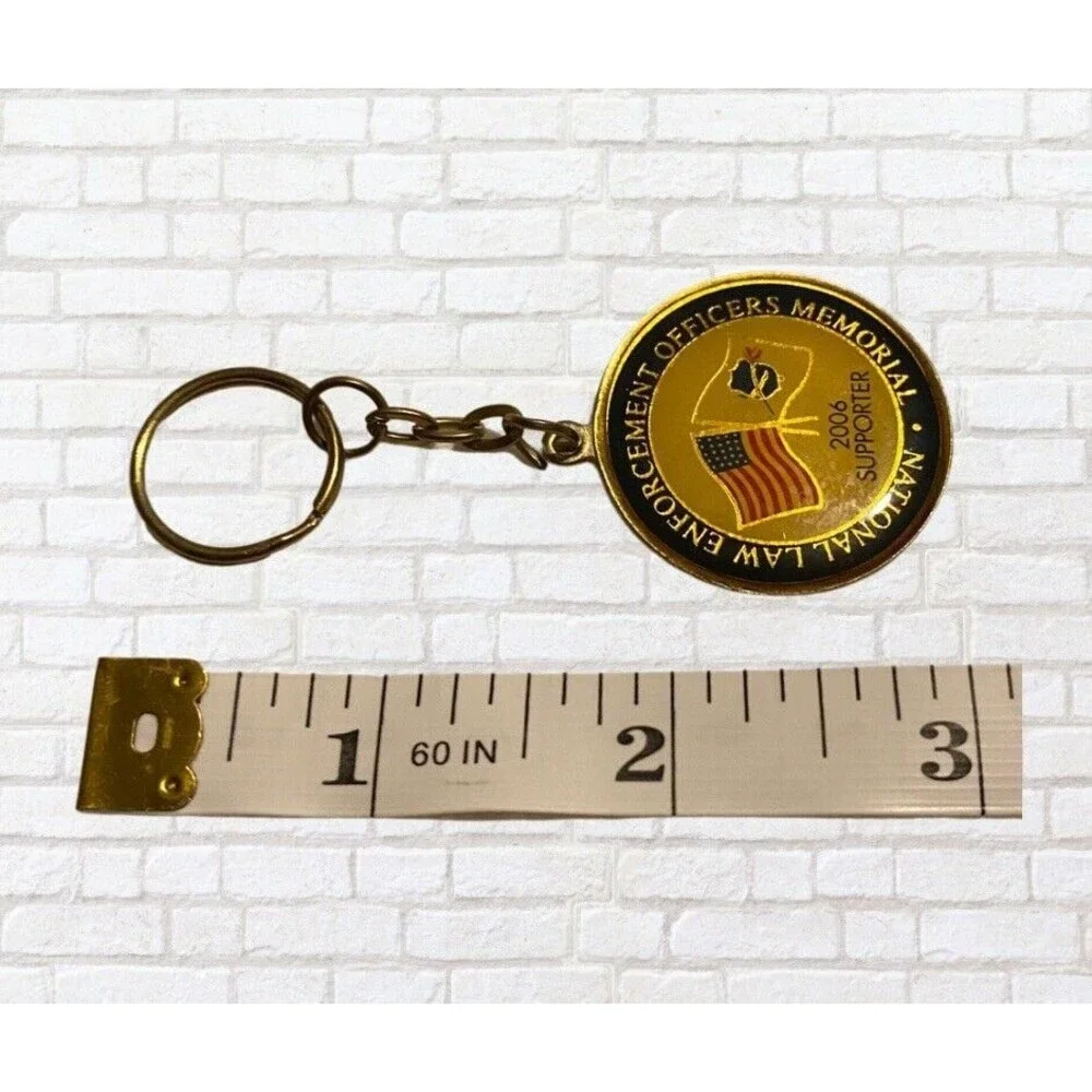 National Law Enforcement Officers Memorial 2006 SUPPORTER Gold Tone Keychain